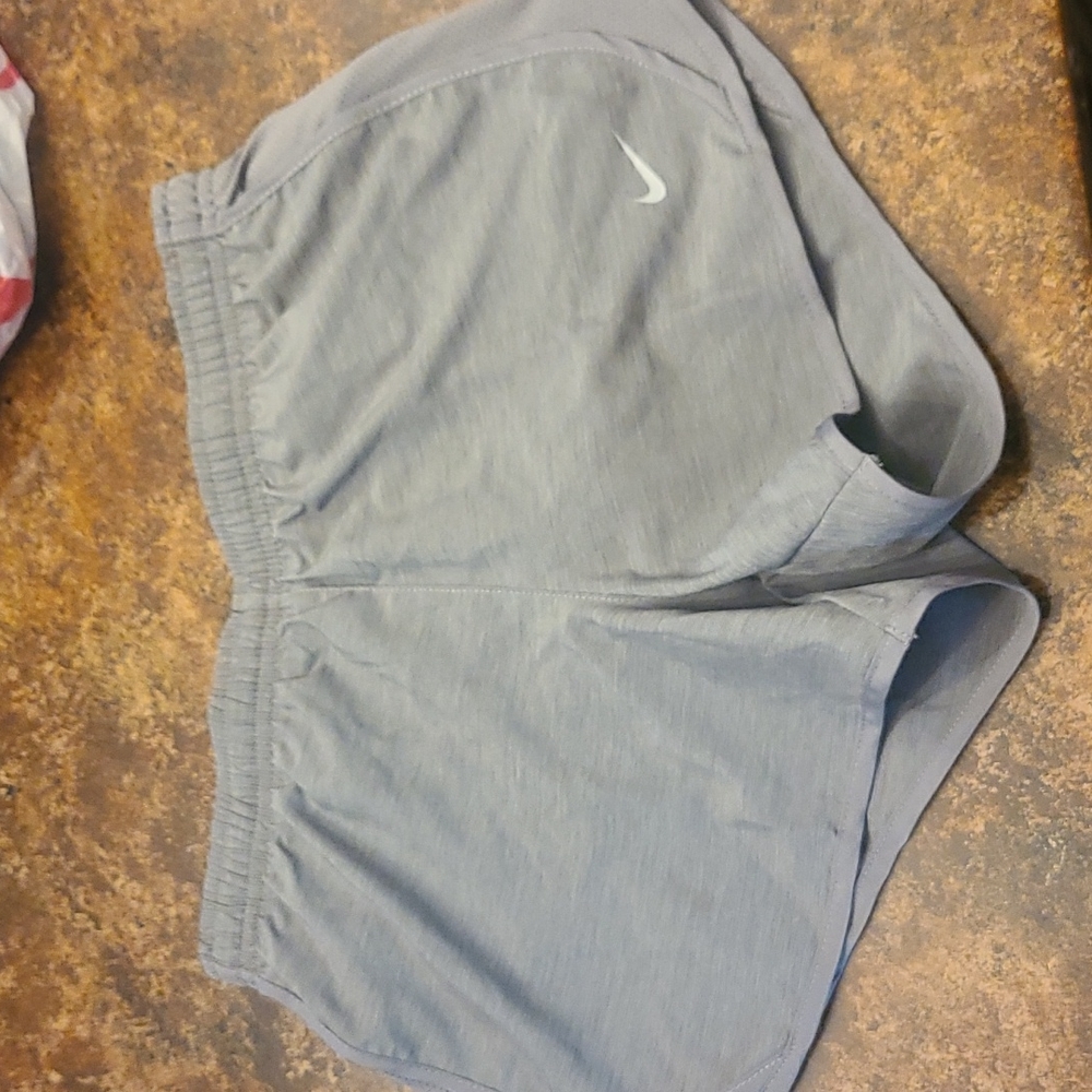 Nike girls athletic shorts.  NWT.  Gray. Sz M
